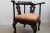 Chippendale style carved mahogany corner chair with upholstered seat and ball and claw feet. Dimensions: 30.5"H (17"SH) x...