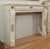 Antique Louis XVI style white marble mantel with light gray veining. Three bronze ormulu floral motifs modestly adorn the...