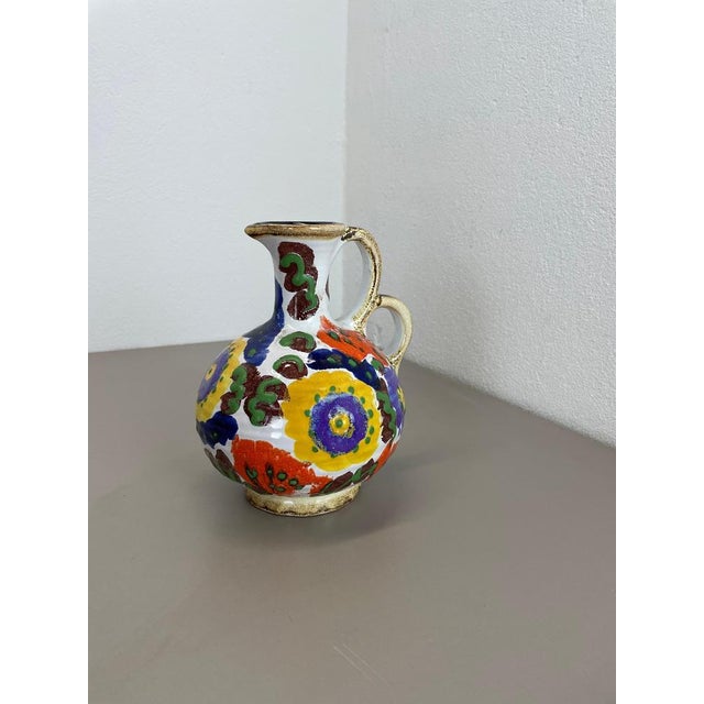 Article: Ceramic fat lava Producer: Marei Ceramics, Germany Decade: 1970s Original vintage Studio Pottery vase was...