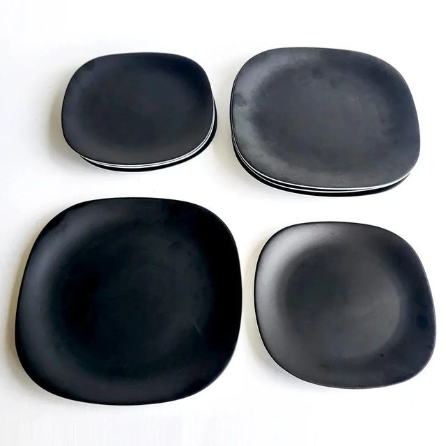 Offered is a set of 1970s Transition pattern matte black surface on white porcelain salad plates and bread plates by Block...