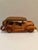 Charming vintage handcrafted wooden model car depicting an early Ford touring automobile. Made from contrasting woods with...