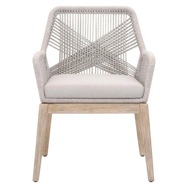 These woven arm chairs will add a touch of coastal style to your kitchen or dining space. Constructed with a reinforced...