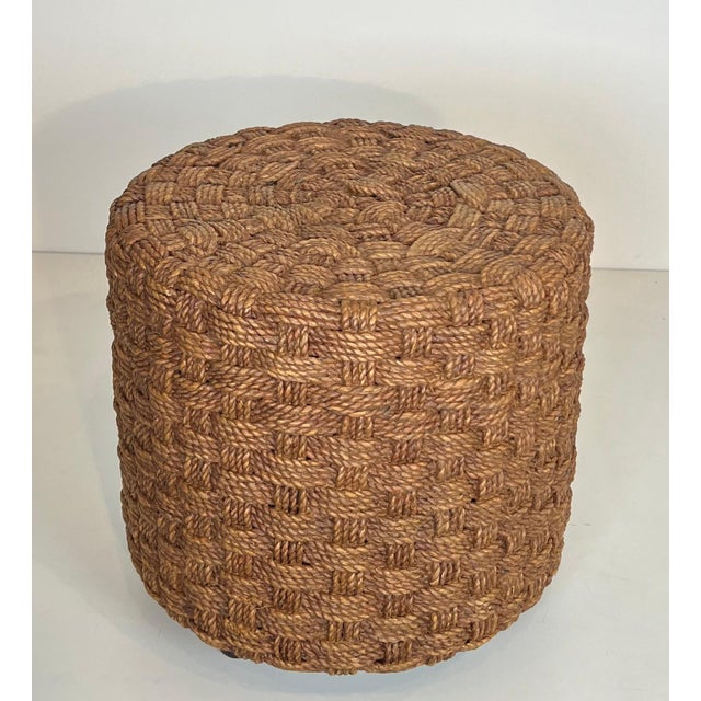 This lovely stool is made of rope with round wooden legs. It is a French work in the style of Adrien Audoux and Frida...