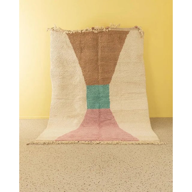 Pastel Time is a contemporary Berber carpet that consists of 100% high -quality Atlas sheet - soft and cozy under your...