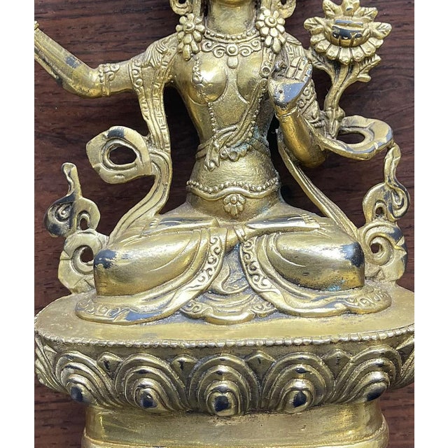 Sculpture - Manjushri. Oriental sculpture; from the first half of the 20th century, in gilded bronze. Height: 16 cm