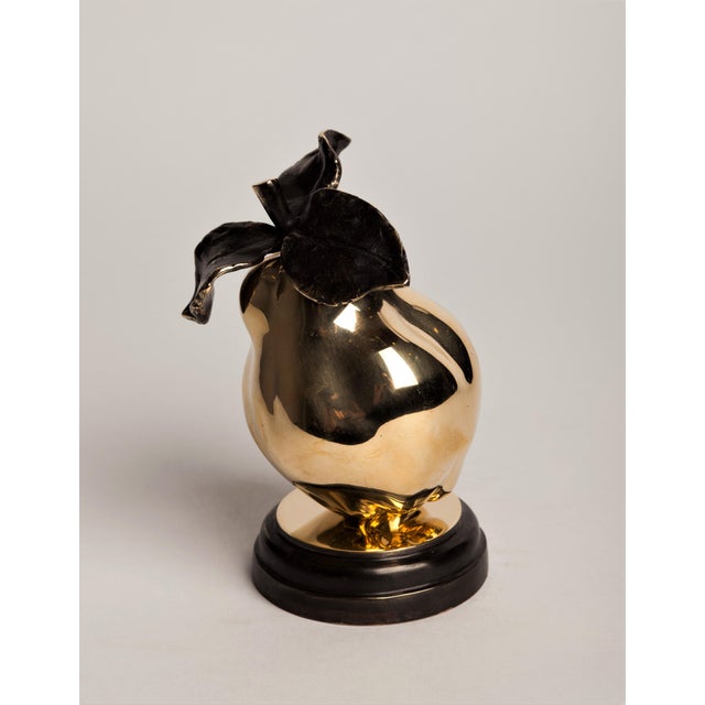 "Quince" — from the *Fruits* series A contemporary still-life bronze of a quince, mounted on a round plinth. Here the...
