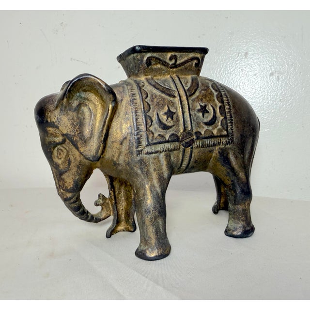 Up for sale is an antique early 1900s AC Williams hand-painted cast iron circus elephant still bank. This collectible bank...