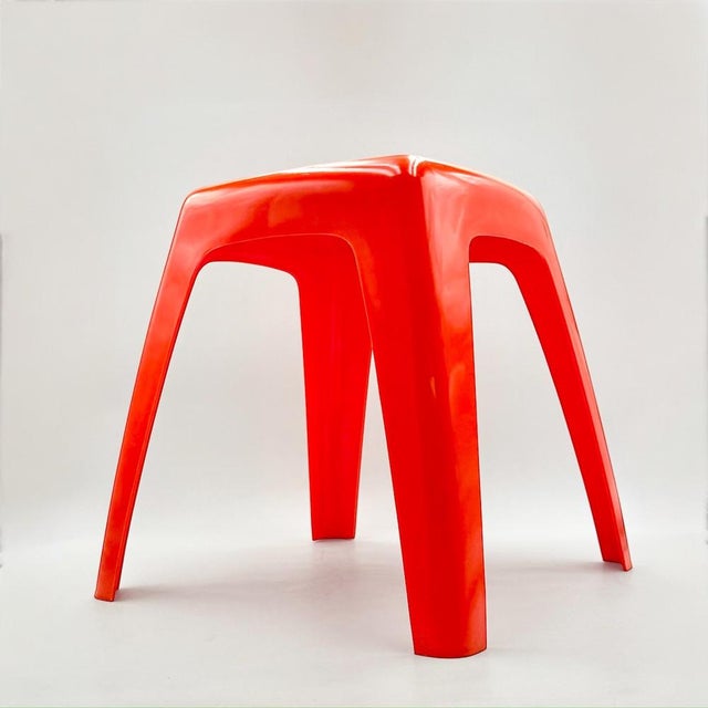 Bold 70s orange stool attributed to Flair embodying the playful, pop-inspired spirit of the era. Measuring 39 x 39 x 39...