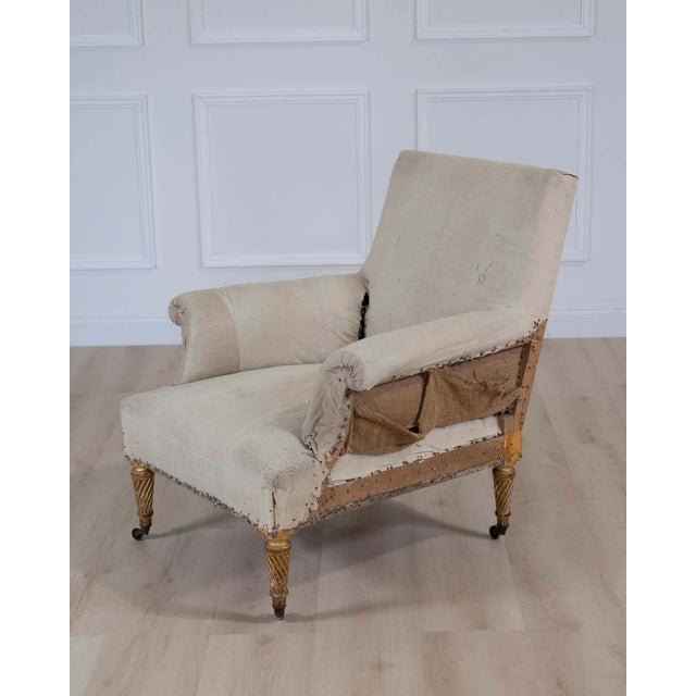 An elegant 19th century French chair featuring graceful carved lines and beautifully balanced proportions characteristic...