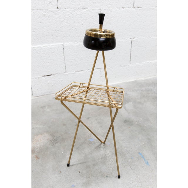1960s Tripod Ashtray in gilded brass in very good condition, it has been cleaned the structure is in perfect condition the...