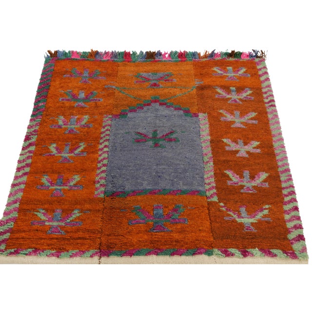 Hand-knotted in wool from Turkey circa 1950-1960, a vintage 4x5 Tulu rug from our Antique & Vintage collection...