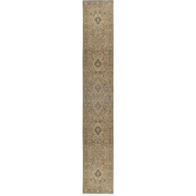 A lovely long and narrow Hamadan runner in light colors.