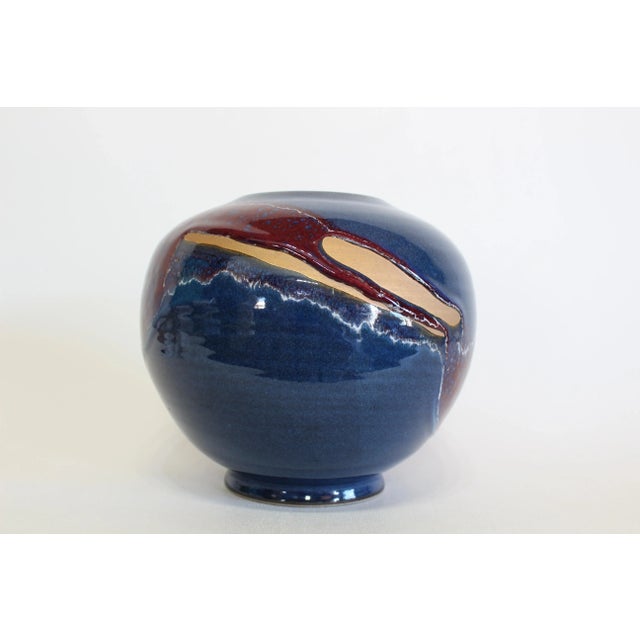 Hand thrown ceramic vase Signed underneath Dimension; 8" Width x 8" Depth x 8" Height See pictures and condition for...