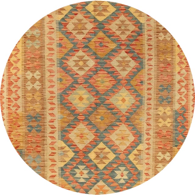 Beautiful modern kilim rug, hand knotted wool with a tan field, multi-color accents in all-over geometric design. This rug...
