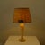 Table lamp, a beautiful furnishing accessory from the Italian luxury brand Brunello Cucinelli. Wooden base and fabric...