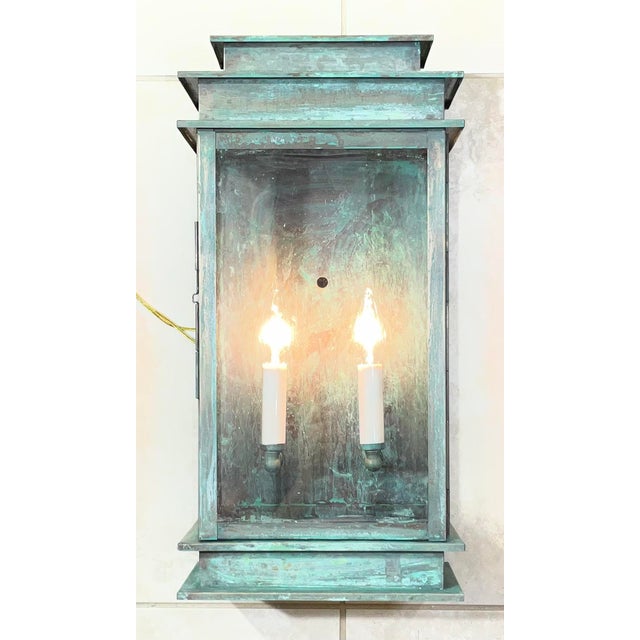 Elevate your entryway, patio, or interior corridor with this lantern , high-end architectural wall lantern. Featuring a...