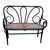 Early Victorian Bent oak settee by Thonet featuring an elegant, sculptural frame crafted from warm-toned bentwood. The...