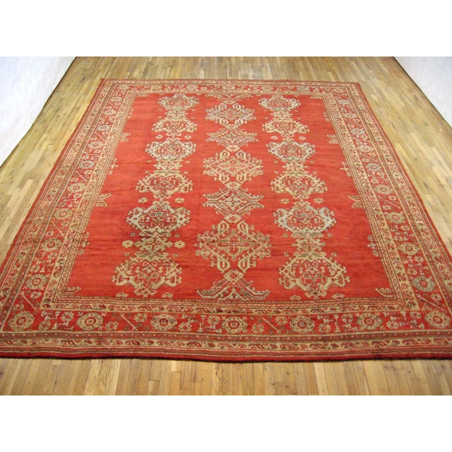 Antique Turkish Oushak Decorative Oriental Carpet, Room size, with Red Field A gorgeous antique Turkish Oushak carpet,...
