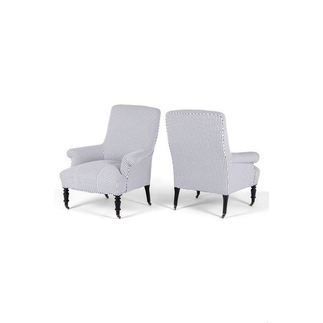 A wonderful pair of 19th century french napoleon iii square back armchair with a low back and a wide generous seat. The...