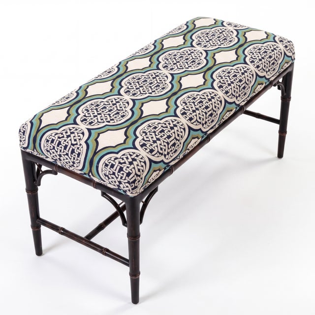 This is a mod-century Chinese Chippendale style faux bamboo bench. The upholstery is gently used. The frame is a...
