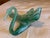 This decorative glass piece is a hand-blown swan-shaped centerpiece bowl created in the Murano style, likely dating from...