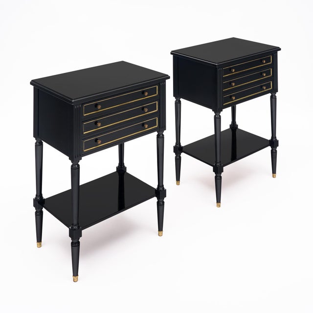 Pair of side tables from France in the Louis XVI style. Made of mahogany wood that has been ebonized and finished with a...