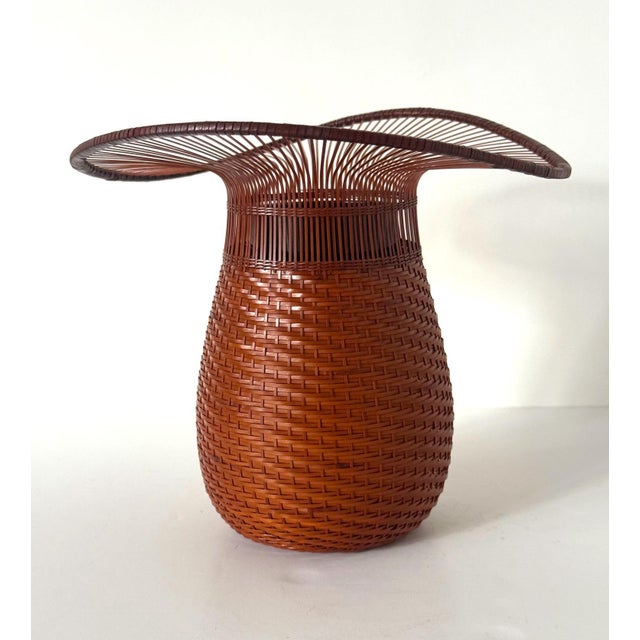 Entitled Toujingasa (Chinese Hat). this delicate hand-woven ikebana basket was made by Japanese Bamboo artist Jin Morigami...