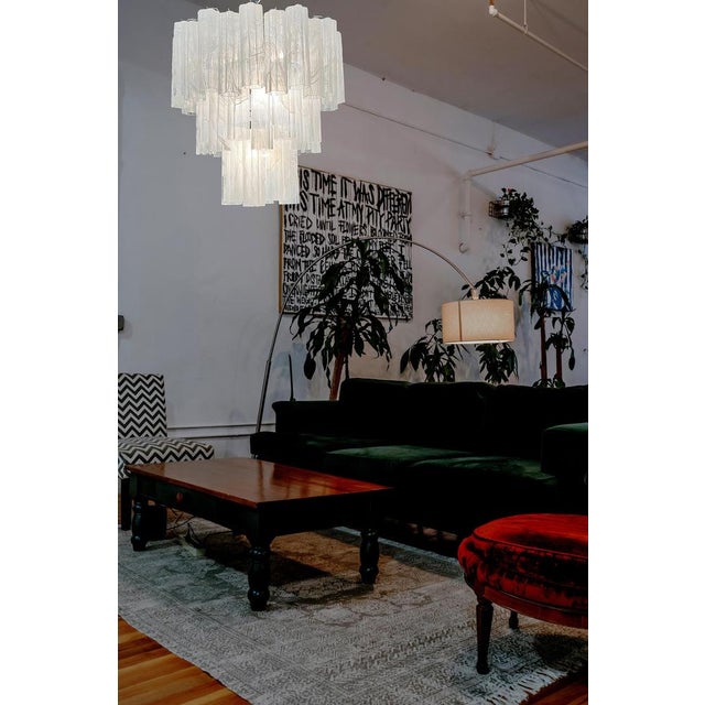 Italian vintage chandelier in Murano glass and nickel plated metal structure on 4 levels. The armor polished nickel...