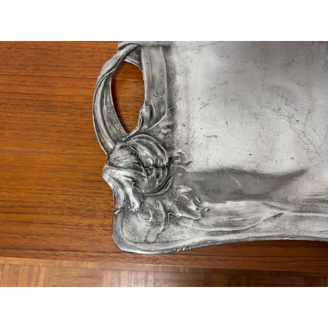 Elegant and sculptural, this antique German pewter tray dates to the Art Nouveau / Jugendstil period, circa 1900–1915. The...