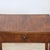 We present this refined antique Italian side table dating back to the early 19th century. It features the stylistic and...