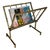 This design magazine rack is made of brass. This is a French work. Circa 1970