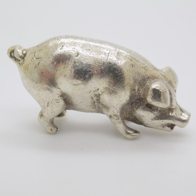 An adorable vintage miniature depicting a piglet, handmade in Italy between the 1970s and 1980s in genuine solid silver. A...