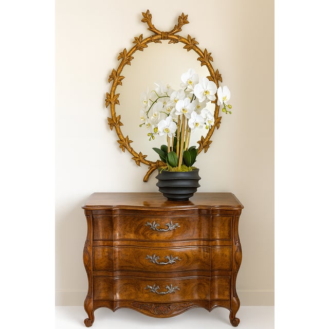 A beautifully crafted French Provincial bombe-front serpentine chest by White Furniture Company, a renowned American maker...