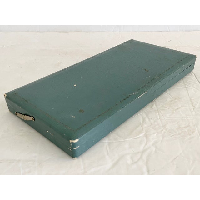 Beautiful vintage set of 6 Asian designed long thin cocktail spoons. Original box included. Nice details on the charms...