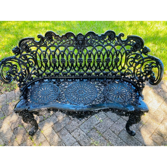 Gorgeous Victorian cast iron bench, the iron work is beautiful with the face of Betsy Ross in the center back. Rolled arms...