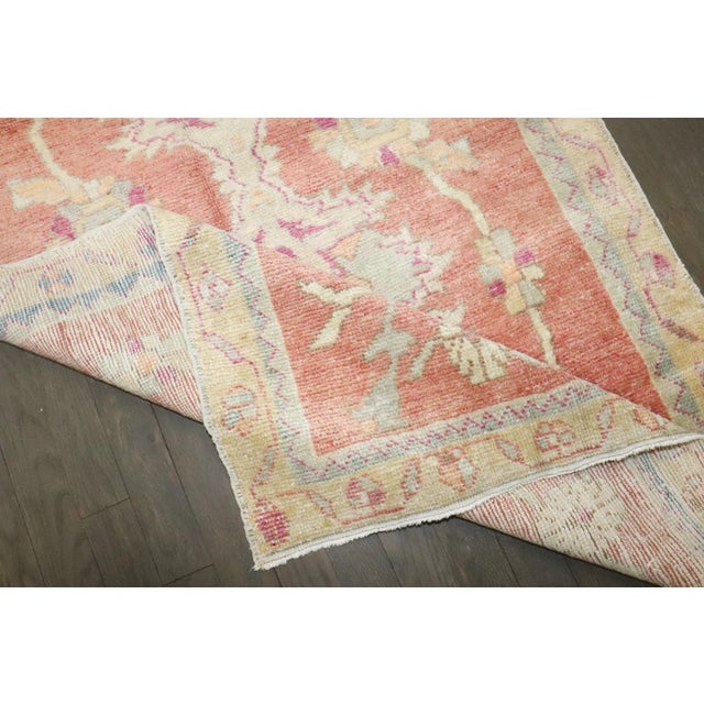 A mid 20th century Turkish Anatolian soft pink red palette small rug