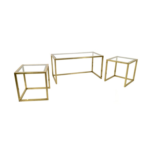 Made in Italy, 1970s. These three tables feature a brass and steel frame with glass tops. They are vintage, therefore they...