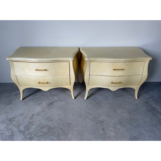 Elegant vintage sculptural nightstands by Jimeco LTDA, handcrafted in Colombia and finished in lacquered goatskin. This...