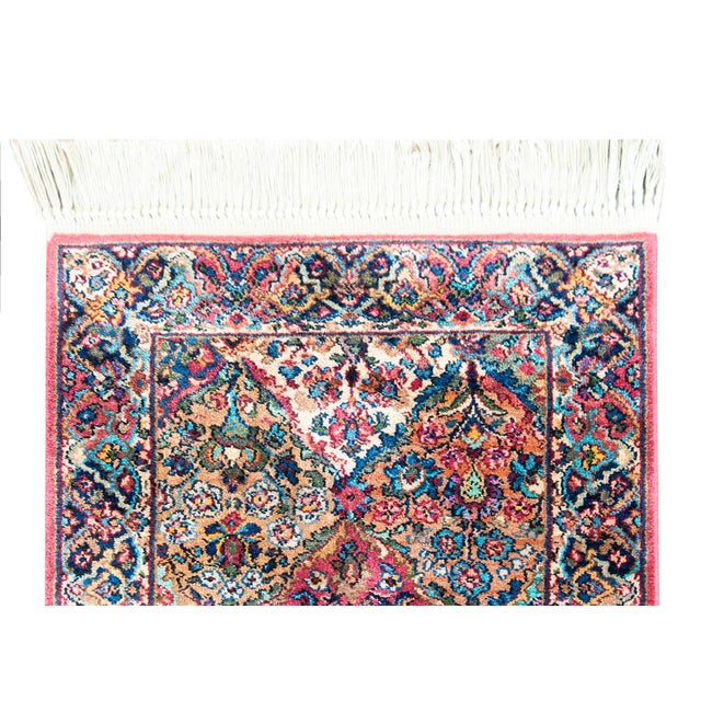 A wonderful late-20th century American Kirastan Kirman-style runner with and all-over diamond floral pattern woven in...