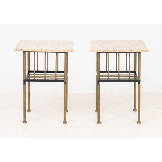 Pair of Modern Pink Travertine Brass Side Tables, with brass spindle undertier. 27" H x 20" W x 20" D. Provenance: From an...