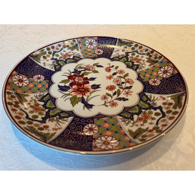 Beautifully preserved 1960s Japanese Imari decorative platter. It has extensive hand applied gilt detailing and very fine...