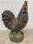 Solid concrete decorative rooster statue boasts a rustic weathered colored finish for an eye catching farmhouse or...