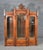 An exceptional masterpiece of American Victorian cabinetmaking, this three-door bookcase is attributed to the renowned...