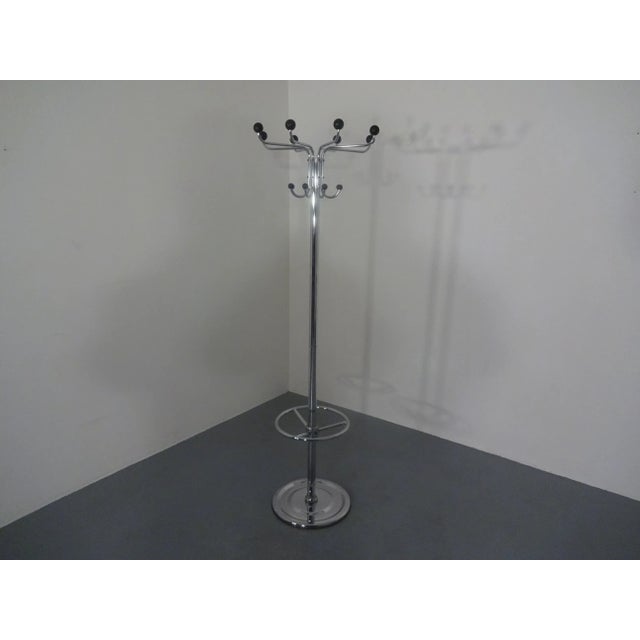 Very large, chrome-plated coat rack with umbrella stand and 13 hooks. Weight