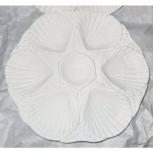 White is always 'in'. This pair of Portuguese oyster plates from Olfraire for Neuwirth retailers form the 1960-70s are in...