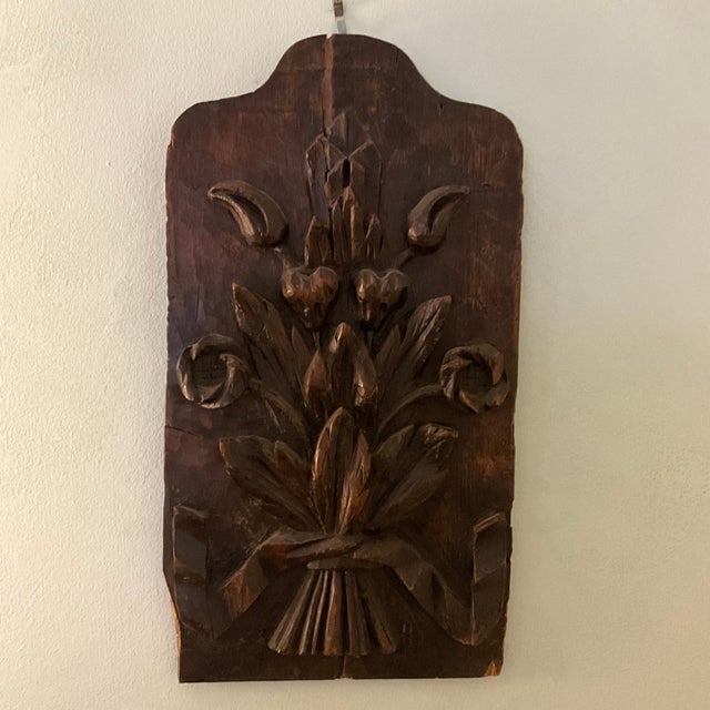 This pair of hand carved wood panels was likely saved from a chest or decorative paneling. Each panel feature different...