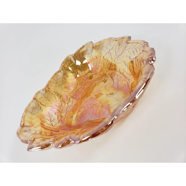 This gorgeous carnival glass bowl is from Indiana Glass (circa 1970s). Note: the original molds produced pieces in pink...