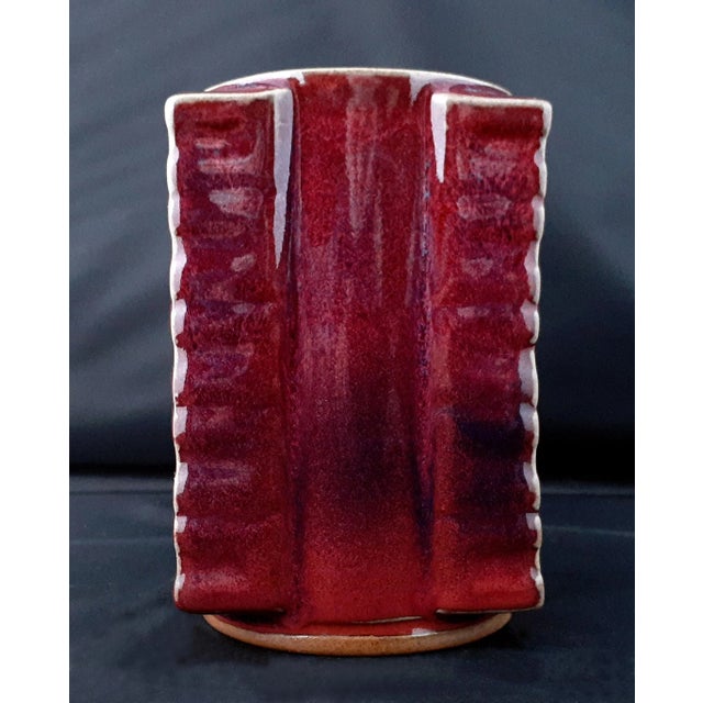 Chinese porcelain flambe glaze Cong vase, flambe glaze with light blue and ecru highlights on the body, lip and foot. The...