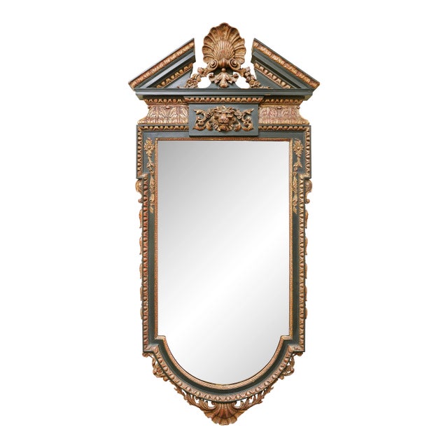 A William Kent Style Ebonized and Parcel Gilt Pier Mirror For Sale