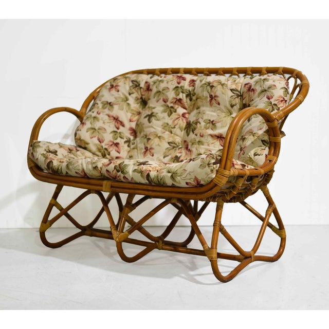 Light, airy, and effortlessly chic, this vintage Palm Beach loveseat brings sculptural coastal style and timeless natural...